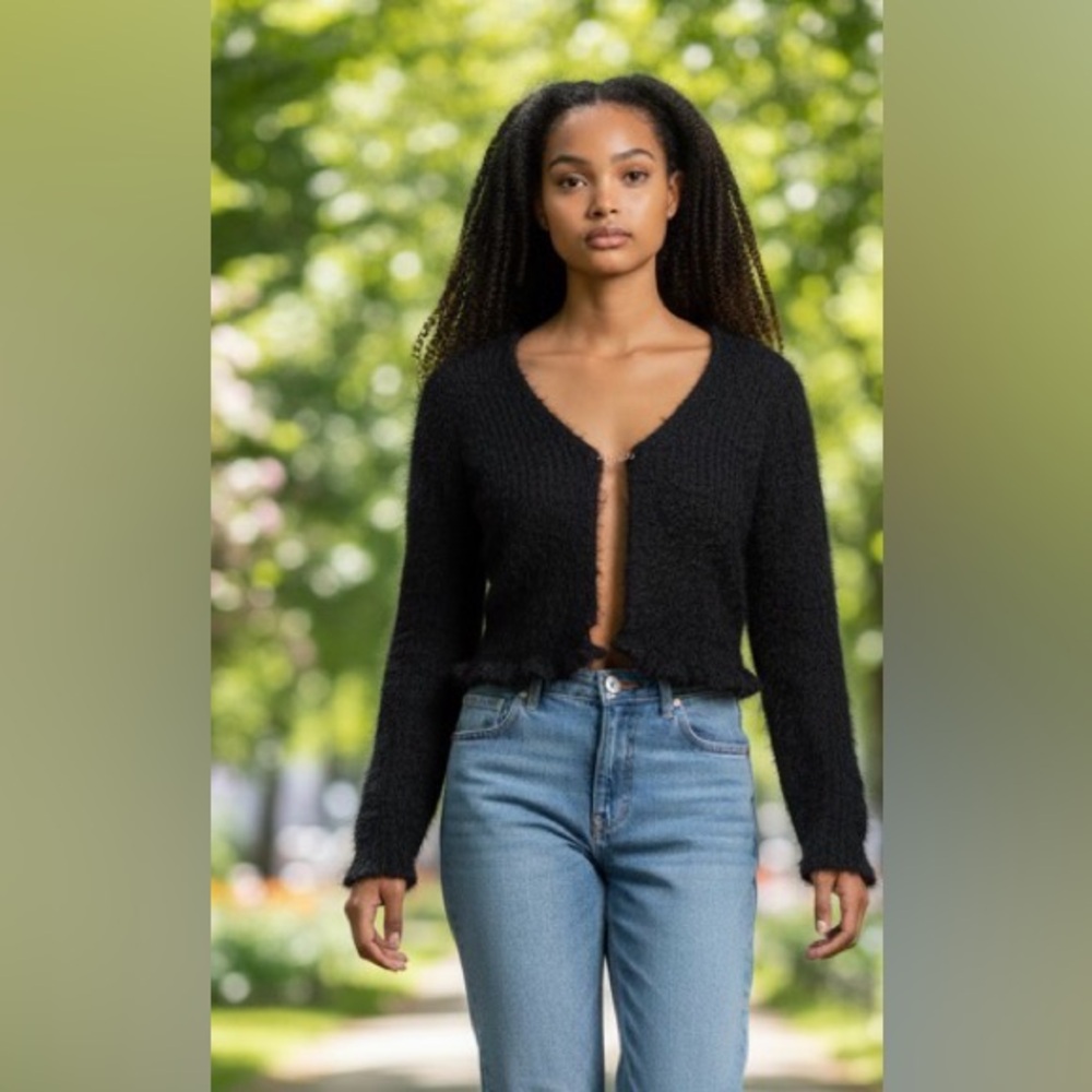 Black cozy fuzzy Sincerely Jules crop cardigan with gold chain clasp @ neckline